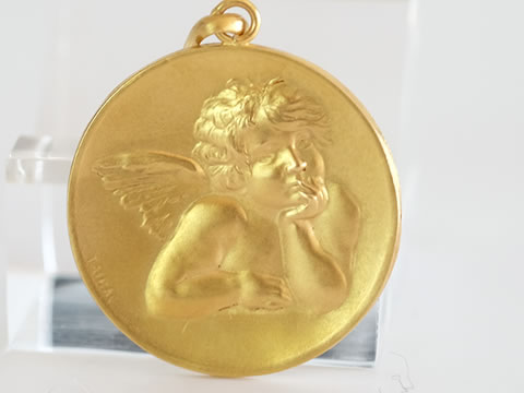 天使ラファエルのアンティークメダル（サイン入り）